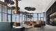 rendering of penthouse with ample seating and modern decor on the ceiling